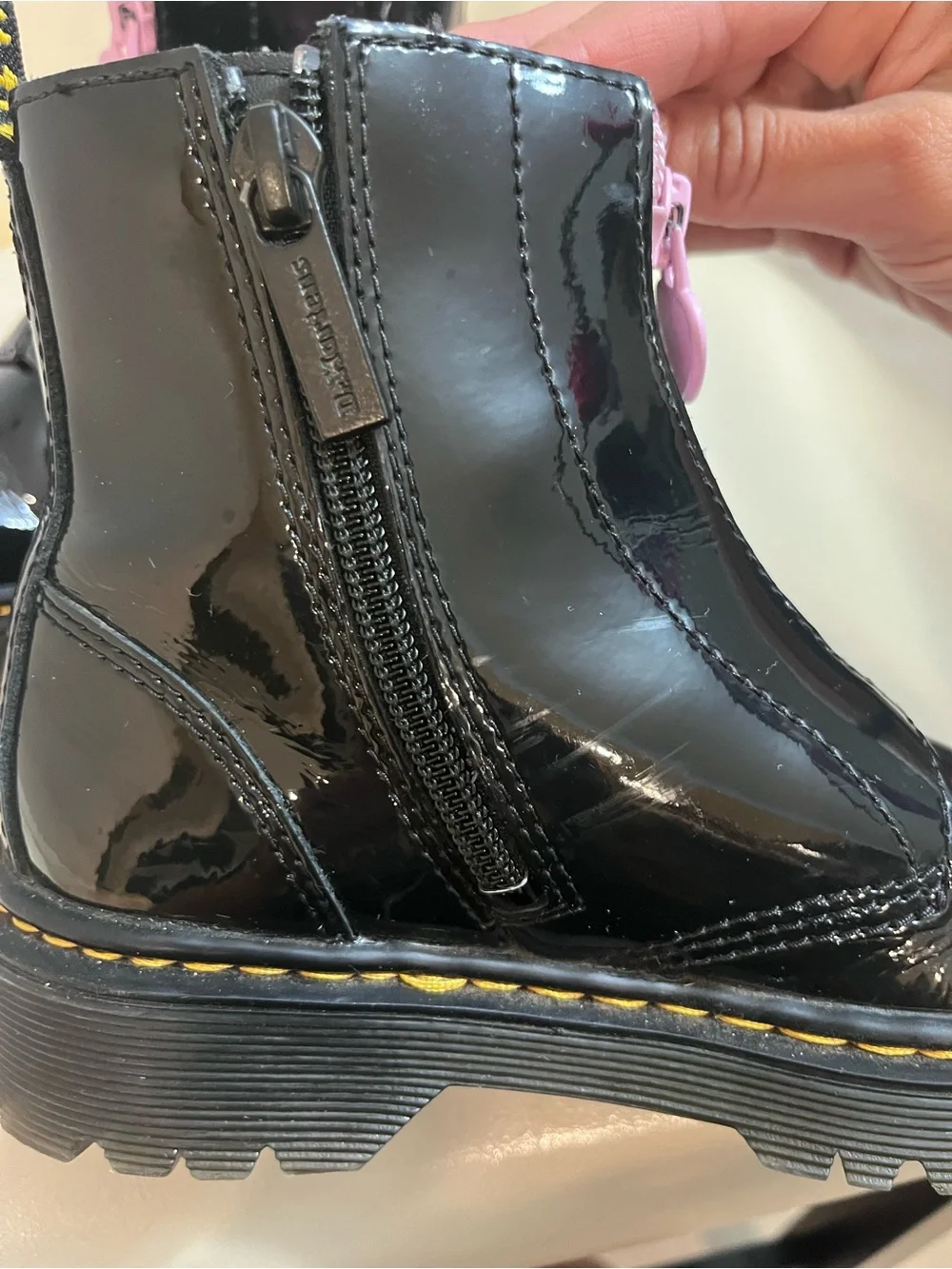 Kids Dr. Martens Black Patent Heart Accent Boots with Pink Lining